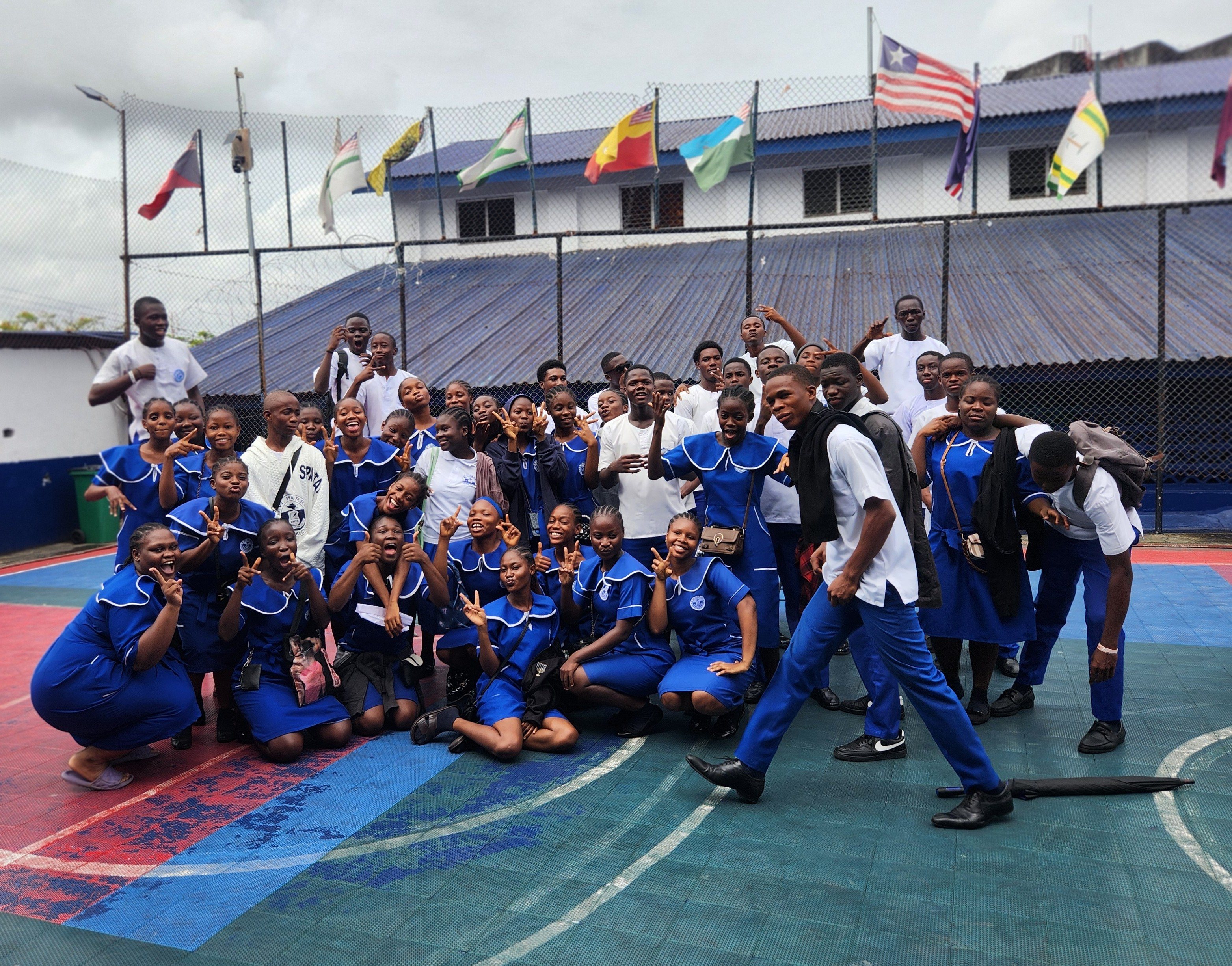 students gathered together taking picture